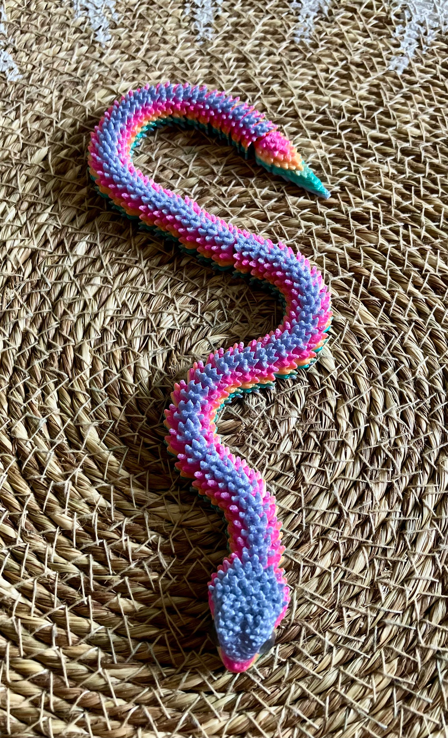 3D Printed Articulated Snake (Rainbow) Layer colours may vary