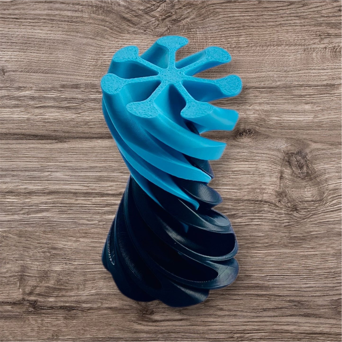 Passthrough/Spiral Cone Fidget (Black and Light Blue)